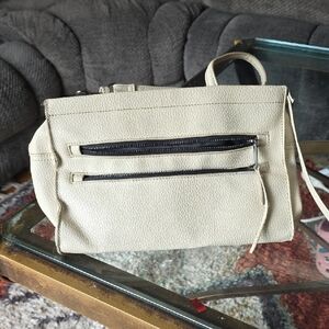 Cream Clutch with Elegant Wristlet Design